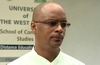 UWI Dominica head gives feature address at NECS graduation ceremony