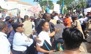 Protestors clash with police in The Bahamas