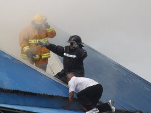PHOTO OF THE DAY: Firefighters get helping hand during Bay Front fire on Wednesday