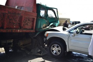 SUV collides with truck under Canefield cliff (SEE PHOTO GALLERY)