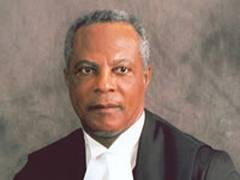 Slow pace of court judgements worries Sir Hugh Rawlins