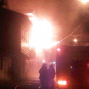UPDATE: One dead as fire razes several businesses in Roseau