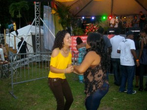 Two women from the Dominican Republic dance to the music of saxophonist Sandy Gabriel at last year's Jazz n Creole