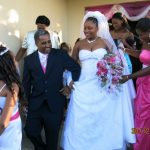 a-beaming-cornel-leads-his-new-wife-out-of-the-church