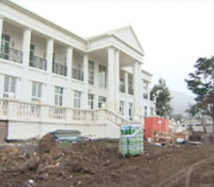 PM defends State House, State College construction