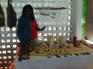 A vendor poses with her products at the Buy Dominica Carnival Extravaganza