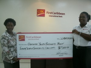 Ceasarina Paul (left) and Rhona Lawrence poses with the donation check on Friday