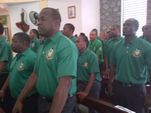 Members of national football team at memorial service