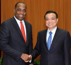 PM Skerrit and Chinese premier Li shakes hand at the Great Hall of the People in China last Wednesday