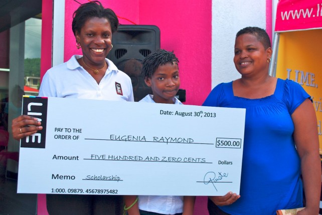 Eugenia Raymond receives cheque from Customer Experience Manager Deanna Noel  