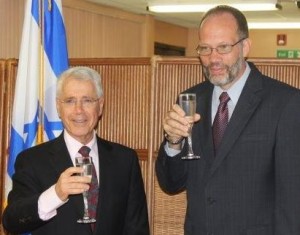 Sec Gen of Caricom Irwin LaRocque shares a toast with Israel ambassador Amiram Magid