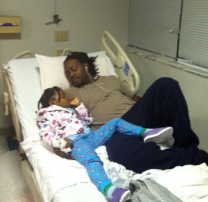 Alainey and her dad at a hospital in the US