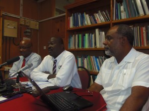 Chief Environmental Health Officer, Anthony Scotland (center). To his right is Dr. Paul Ricketts
