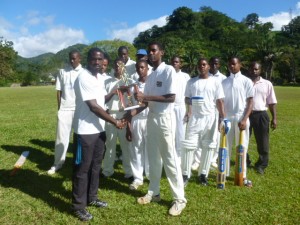 Captain of Pierre Charles Secondary receives trophy 