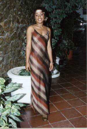 Mark as a contestant of the Miss Dominica Pageant in 2002