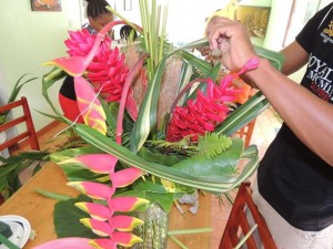 A student shows skill in floral arrangement