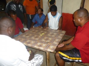 A study in concentration as competitors do battle for the Digicel domino title