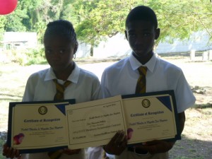 Kaihil Charles (left) and Myinka Jno Baptiste pose with the certificates