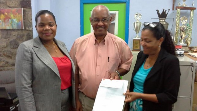 Sagicor staff member, Ruth Augustine, Phillip White of  the Red Cross and Cheryl Rolle are all smiles during the presentation 