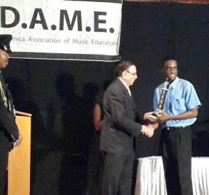 Douglas being awarded for his outstanding performance 