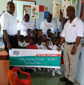 Rubis Dominica presents $3000 to Wesley Community Preschool