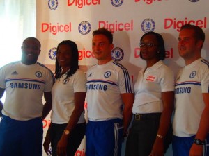 Chelsea coaches pose with Digicel officials 