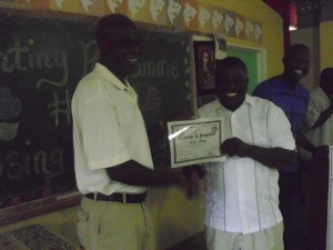 Parl Rep Drigo and challenger Baptiste  presented the certificates         