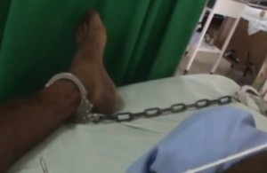 Video shows Denny Shillingford shackled to hospital bed