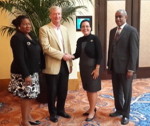 From left, Deputy-Manager  CARICOM Secretariat, Jennifer Britton, CEO of CDNS, Paul Kane CEO of DotDM, Ambassador Jennifer Aird, ICANN Caribbean Manager, Albert Daniels 