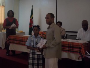 Student from Woodford Hill Primary School receiving award