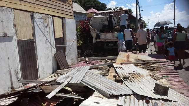 A dump truck crashes into a house at Pte. Michel