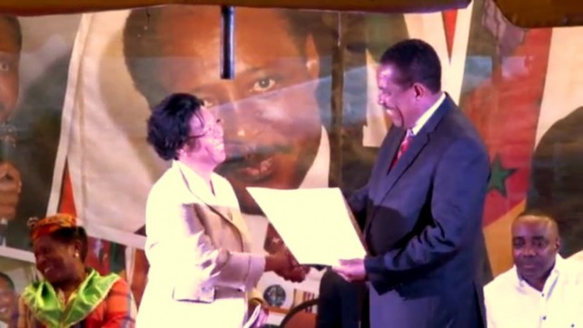 Joyce Dear receives citation from President Saverin on behalf of Douglas family