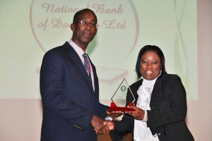 Ellingworth Edwards, managing director of NBD, receives awards from .....