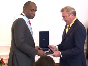PM Skerrit receives the cross from head of Sacred Military Constantinian Order of Saint George