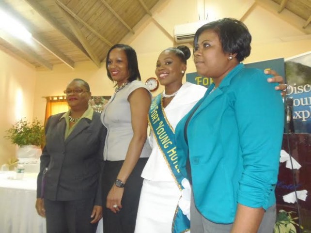 Righton (second right) poses with officials on Wednesday