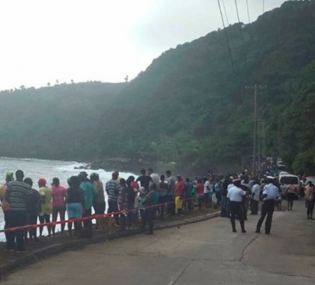 People gathered at the site of the tragedy. Photo credit: SVG TV