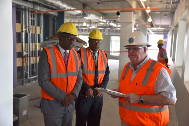 PM Skerrit (far left) tours expansion work at Ross University last week