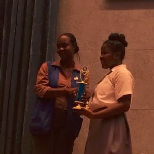 Almyra Lewis of the PSS receives her trophy