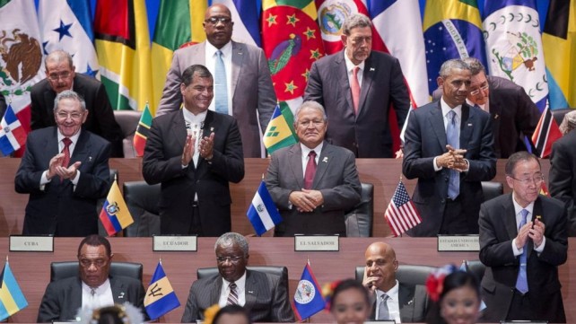 Heads of state at the Summit of the Americas in Panama. Dominica's flag is in the background 