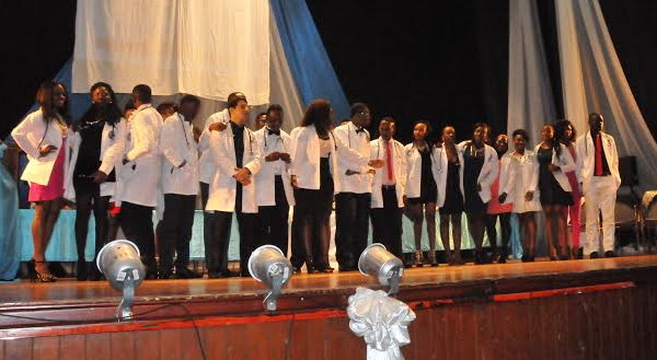 The students received their white coats during the ceremony 