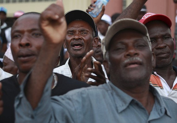  Haitians protest while waiting to register in the so-called "regularization" program in Santo Domingo on June 17, 2015. Photo credit: Reuters 