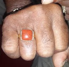 Shillingford shows his ring with a Red Jasper stone