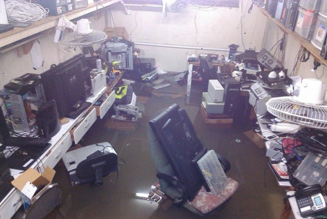 An airport office rendered inoperable by water from the storm