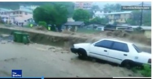 VIDEO: Erika flood waters rush over car tops in Dominica