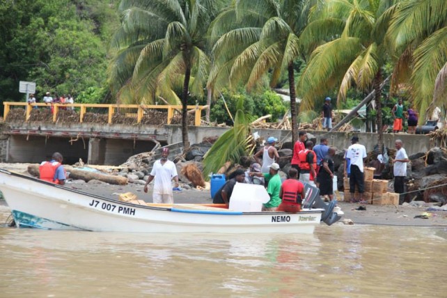 Residents of Coulibistrie receive supplies after Erika. The community was named a special disaster area. Photo by Chad Ambo 
