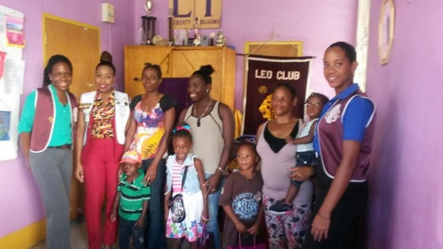 The students with Leo Club members 