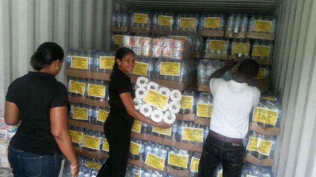St. Lucia Yellow Pages team preparing items to be sent to Dominica 