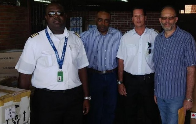 CARICOM SG Irwin LaRocque (right) with National Security Minister Blackmoore (second left) and Guyanese pilots