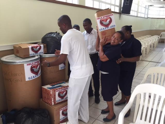 Volunteers pack the items to be sent to Dominica 