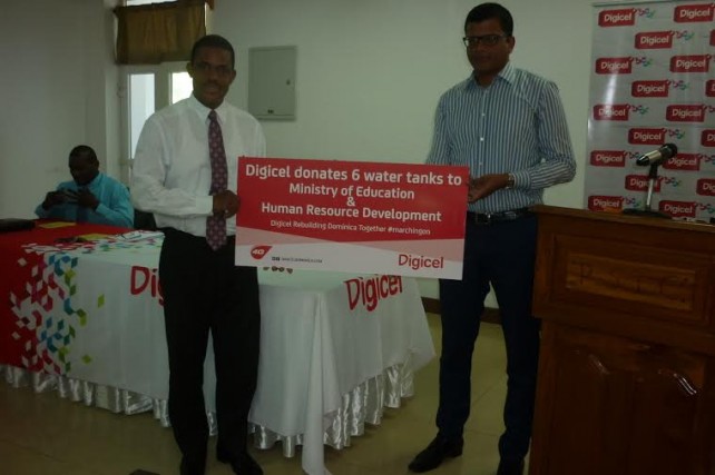 Education Minister Petter Saint Jean (left) and Digicel's Vivek Sharma